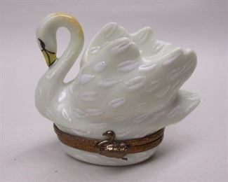 A Peint Main Limoge France trinket box signed M.M.  In the form of a Swan  2" tall 