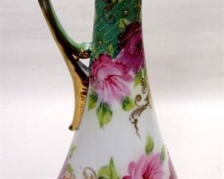 Porcelain ewer, hand painted floral motif