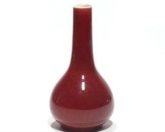 Lot 95 | QING DYNASTY SANG DE BOUEF POINT BOTTLE VASE