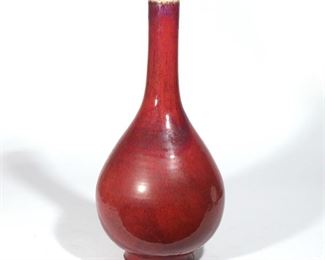 Lot 101 | QING DYNASTY CHINESE SANG-DE-BOEUF BOTTLE VASE