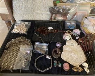 String of pearls; vintage silver purse; vintage gunmetal chain purse from early 1900's; vintage turquoise and sterling silver earrings; vintage beaded clutch