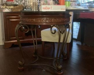Glass top breakfast table with wood and metal base