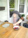 She took off her sunglasses and came out on the porch