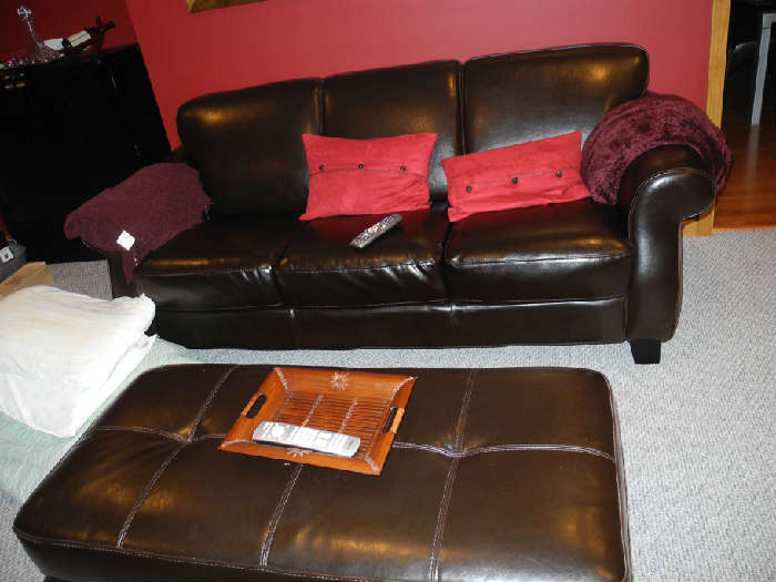 Gorgeous leather sofa and ottoman (can be purchased separately)