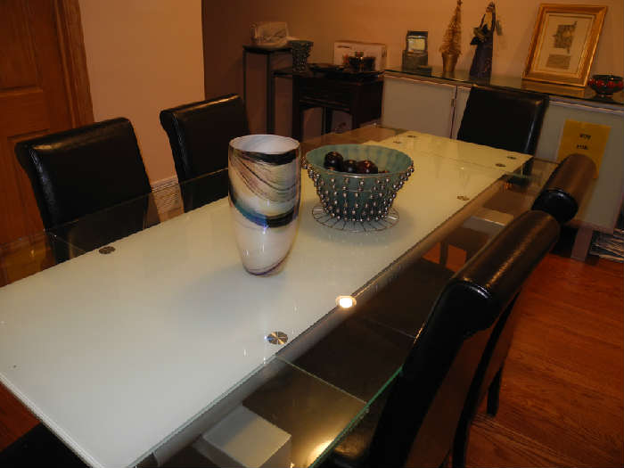Super modern frosted glass table (pull out glass leaves) with six great leather chairs
