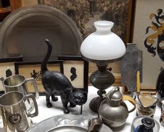 Pewter platter, teapot, cast iron cat, antique print