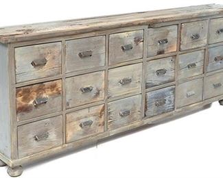 Rustic general store apothecary cabinet, 18-drawers, metal hardware, blue and brown paint remnants.
38.5"h x 96.5"w x 13.5"d