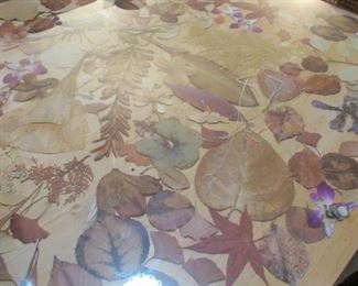 floral leaves under glass top table