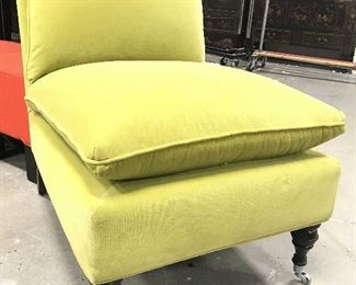 Upholstered Armless Chair On Casters