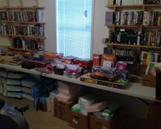 Lots of vintage VHS tapes and games.