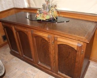 This is a wine cooler with shelves for your wine bottles