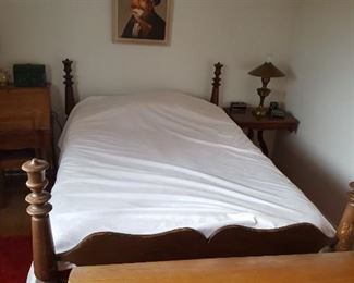 Antique four-poster full size bed