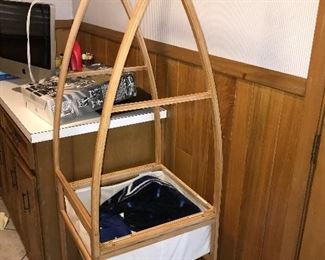 Boat shaped clothing rack
