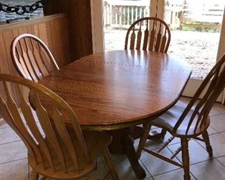 Solid wood table with leaf and 4 chairs