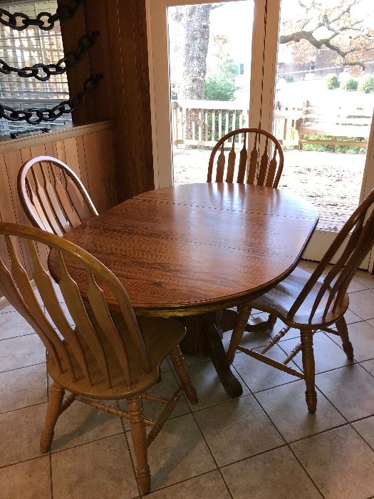 Solid wood table with leaf and 4 chairs