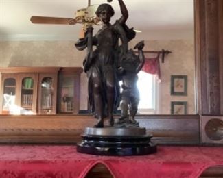 One of pair of bronze statues