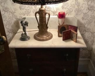 Slag glass lamp on Walnut washstand
