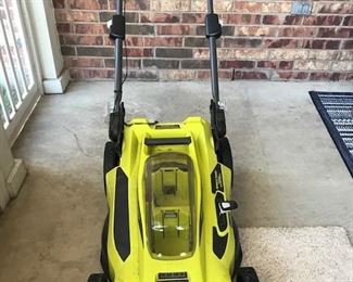 Ryobi battery mower with charger and station.  Almost new! 