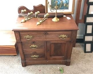 Antique washstand.  The back pieces are loose, but front is in very good shape. 