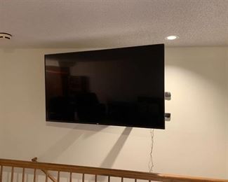 Vizio 70 inch Internet capable television set wall-mounted