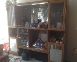 Wall unit with glass doors.  Comes apart in three sections.  Measures 87" w x 77" H x 17.5" deep.  Presale at $75