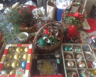 Shiny bright bulbs, vintage star, baskets, candle and wreath