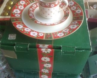 Set of eight Christmas plates, cups and saucers.  