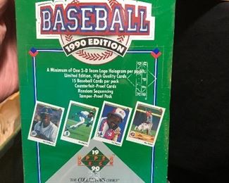 Lots of unopened wax! Baseball, Football, Basketball, Hockey and Racing..