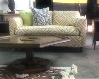 Newly recovered loveseat.  Has tear in back which could stay if put against the wall. 