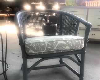 Set of two vintage, freshly painted cane back chairs newly recovered w Sunbrella fabric. 