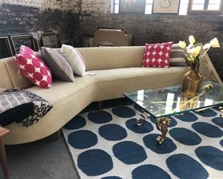 Vintage circa 1950's custom curved sofa.  Reupholstered although has minor stains on curved part.  Very comfortable and very fashionable now.  Greatly discounted from original price. 
