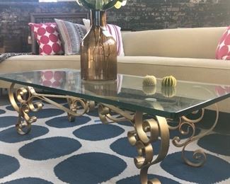 Vintage gold leafed iron scrolled Hollywood Regency coffee table with almost 1/2 " thick glass...drastically reduced!