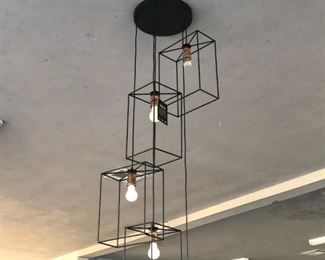 New light fixture from Elk Lighting, 5 Iron square pendants that can be hung from varying heights. Hard Wire. 