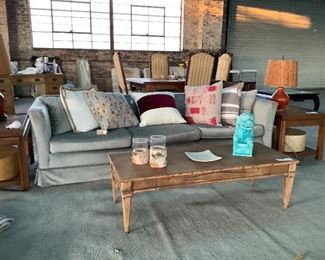 Henredon vintage sofa recovered in light blue velvet in excellent condition.  Already sanded and ready to paint, vintage MCM long wooden coffee table. Various assortment of pillows, new from Showroom with down cushions. 