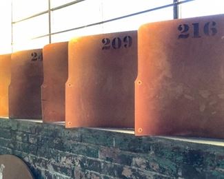 A bit of history from LSU...original wooden seat backs from an LSU stadium classroom, numbered at top.  (I have 3 stacked up a wall--looks great!)