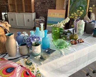 Assortment of frosted and gloss glass vases and ceramic vases. 