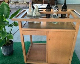 Vintage Bar cart on casters. 