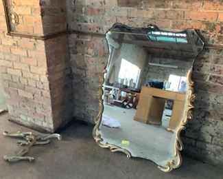 Vintage iron scroll mirror.  Some scrolling is off, but for handyman, can be re-applied. 