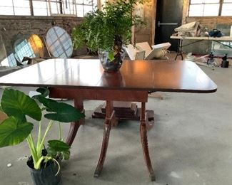 1950's Wooden, Chippendale style table with fold down leaves.  Excellent for accent table or dining. 