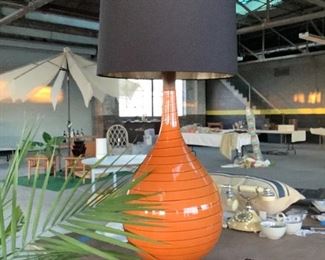 Vintage MCM very large ceramic orange stripe lamp with wooden neck and base and black with gold interior shade.  Came from the Crawford house that was regrettably torn down on Country Club Dr. 