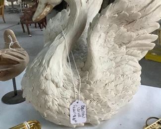 I love this little happy goose!  Very kitschy but surely he has a home somewhere.  