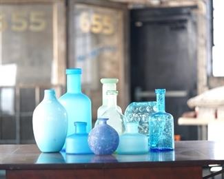 Assortment of blue glass vases, looks so good grouped!