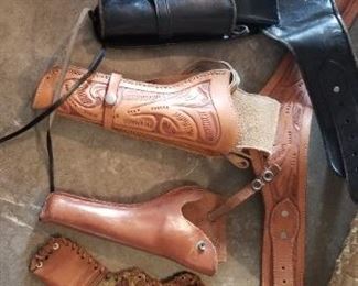 Toiled leather holster and gun holders