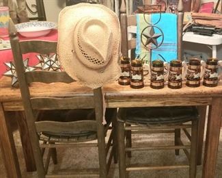 Rustic setting: Slim table , two chairs and Texas cups