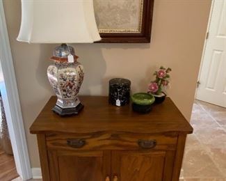 $120.00 Oak chest, $42.00 Oriental lamp, Framed punchwork, decorative items