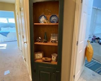 $95.00 Narrow shaker-style cabinet displaying pewter, collector plates, and more