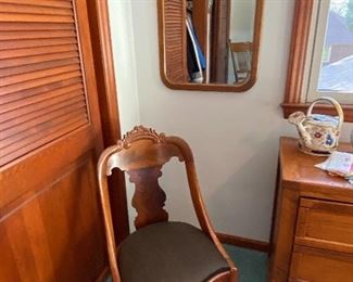 Ca. 1860 chair with original horsehair upholstery, beveled mirror on wall
