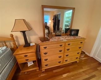 Maple dresser with mirror $225.00, night stand $45.00 and a bit of the bed