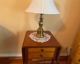 $75.00 Cherry drop-leaf stand with two tiger maple drawers.  Lamp is Stiffel