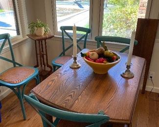$120.00 Drop leaf oval vintage table with one leaf.  Set of 4 turquoise chairs $195.00.